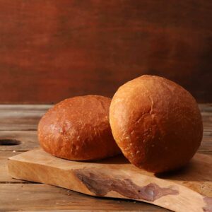 Side view of two brioche rolls