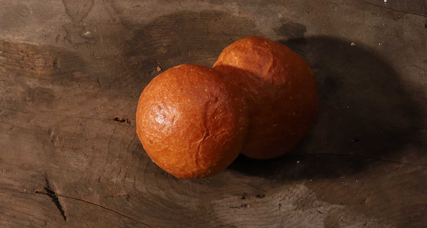 Two brioche rolls top view