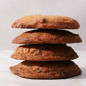 Chocolate chip cookies stacked on top of each other