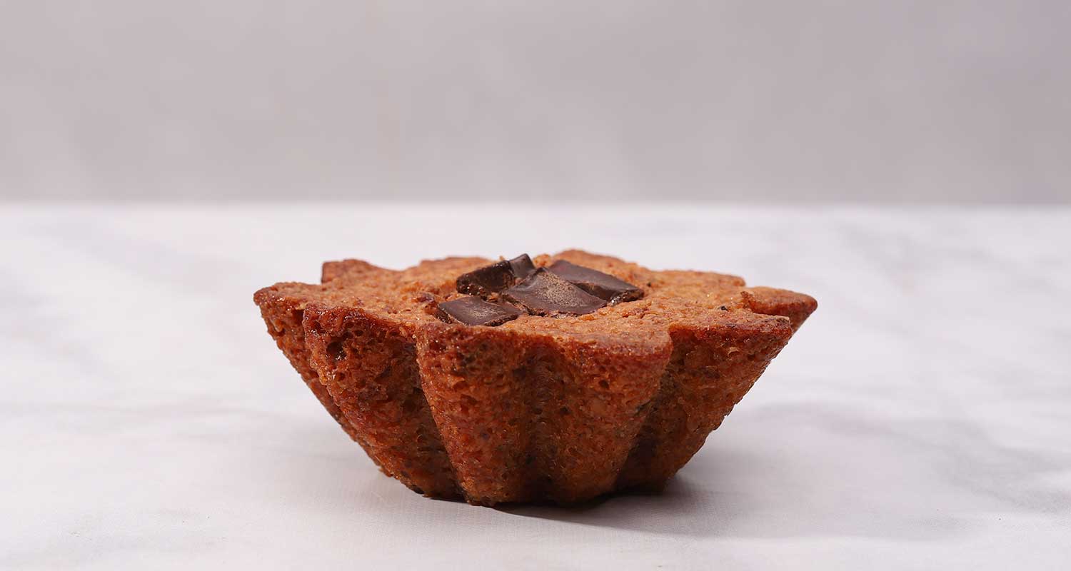 Chocolate pecan financier side view