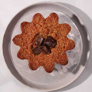 Top view of chocolate pecan financier square photo