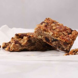 fresh made granola bar in half to show detail