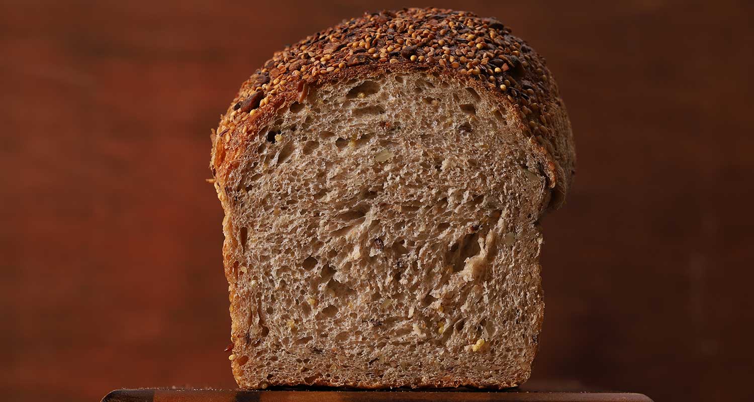 Seeded Wheat Bread Pan Loaf End Cut